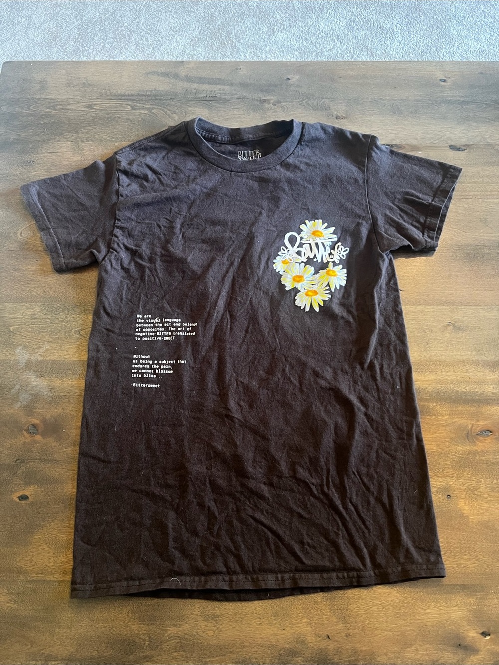 Butter Goods Black Tee with White & Yellow Daisy Graphic